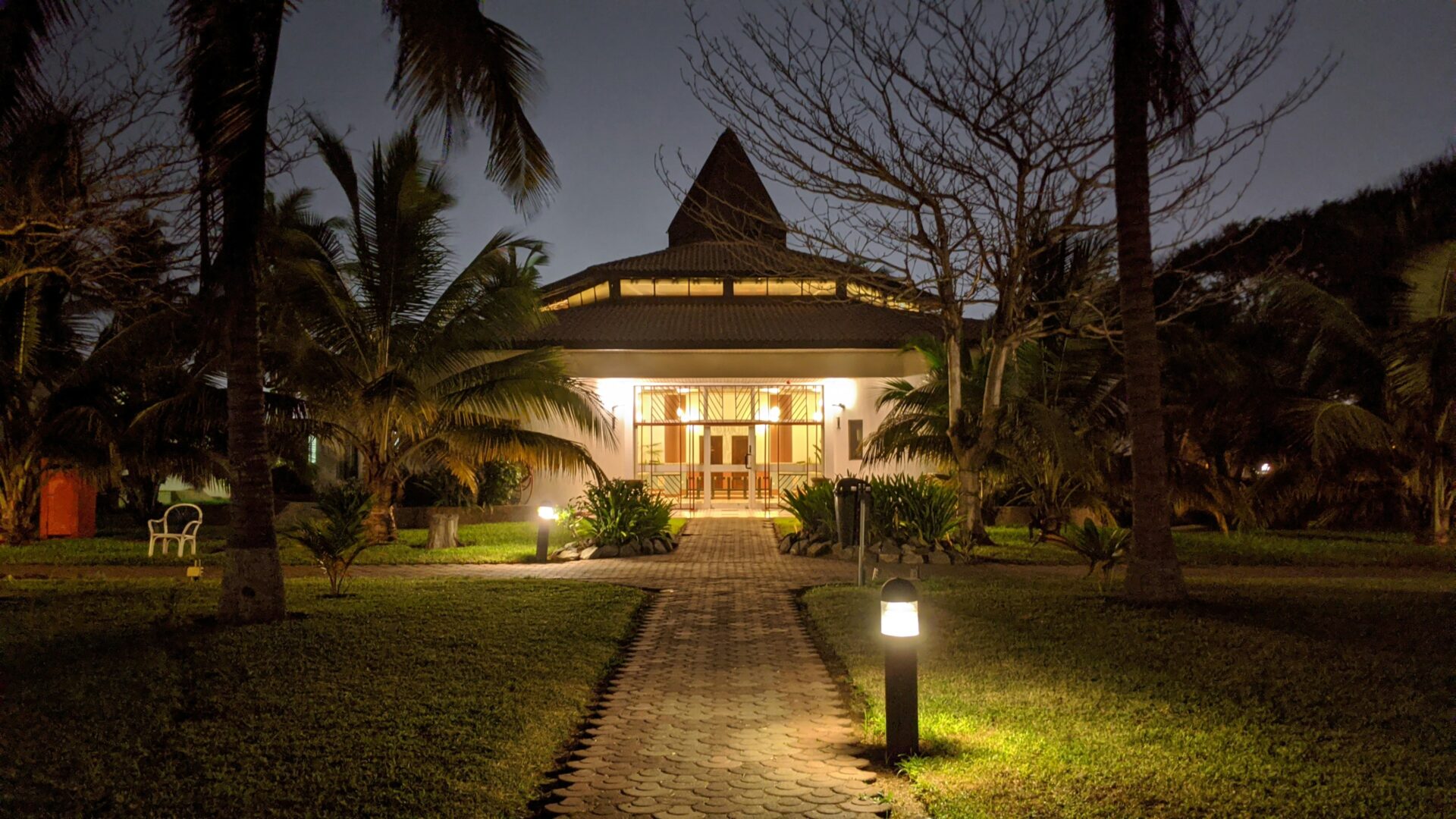 A house with lights on the front of it